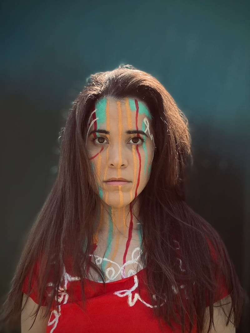 Third image is framed close enough that only the green of the electrical box is visible in the background, mirroring the close up of the book’s cover.